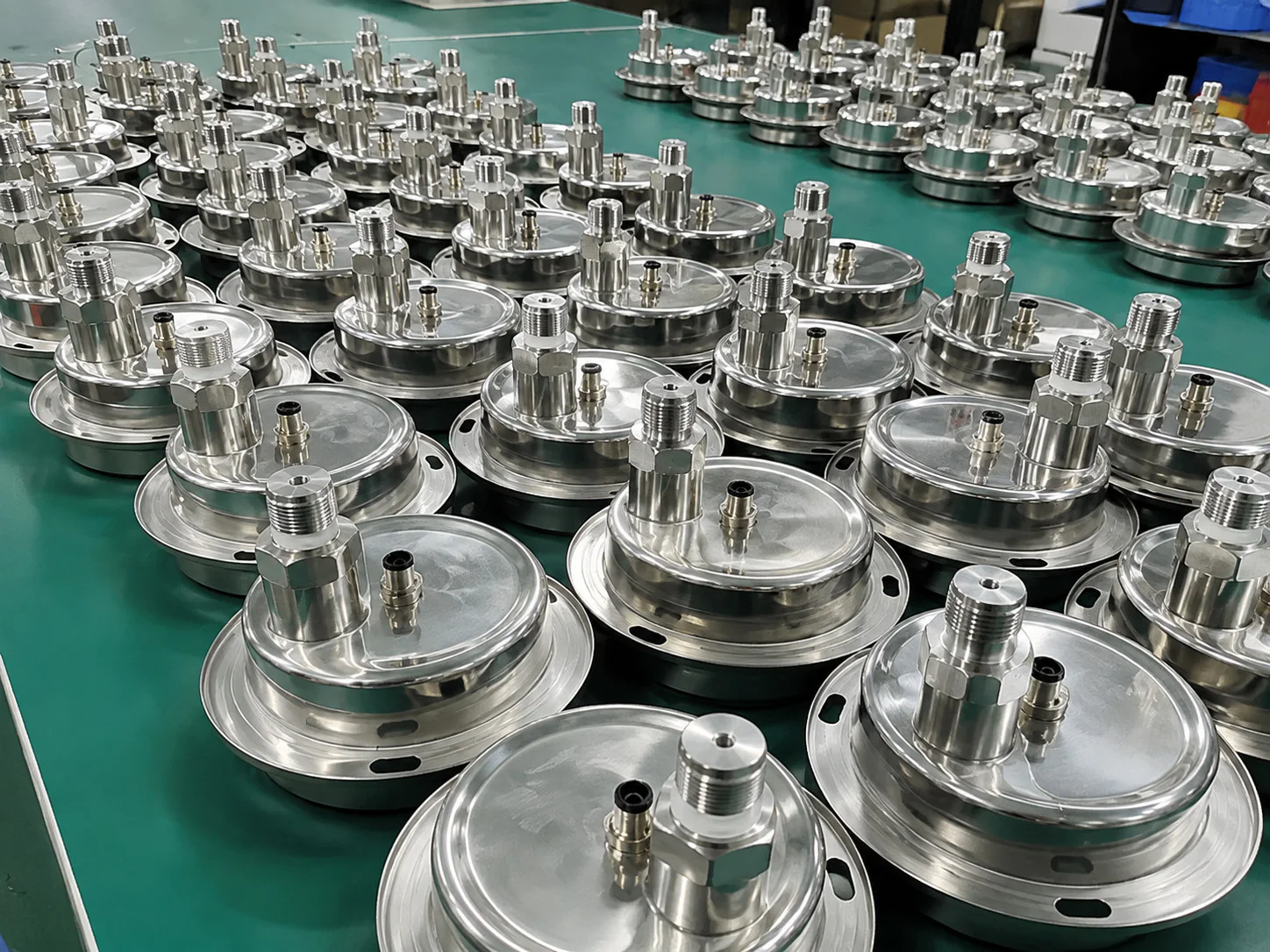 Finished stainless steel transmitter assemblies prepared for final inspection